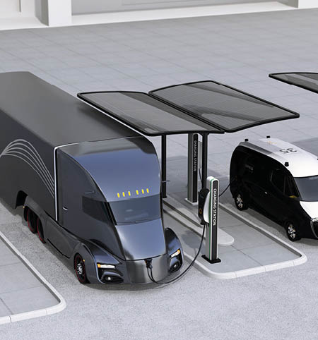 Electric truck and van charging at charging station powered by solar panel system. 3D rendering image.