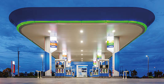 gas station in blue night sky 