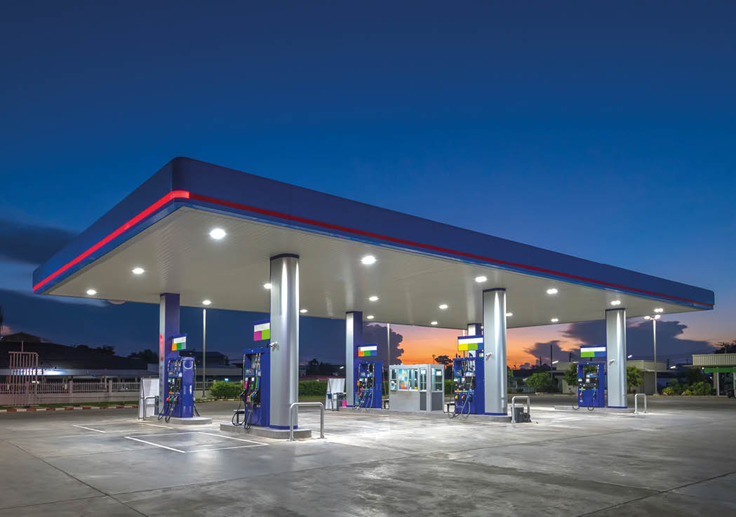 Gas fuel station with sunrise sky