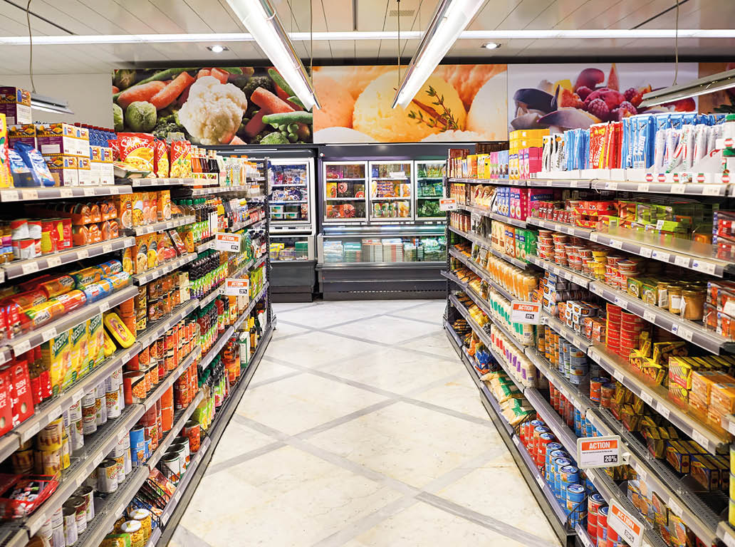 GENEVA, SWITZERLAND - SEPTEMBER 19, 2015: interior of Migros supermarket. Migros is Switzerland's largest retail company, its largest supermarket chain and largest employer