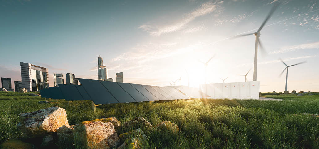 Concept of sustainable energy solution in beautifull sunset backlight. Frameless solar panels, battery energy storage facility, wind turbines and big city with skycrapers in background. 