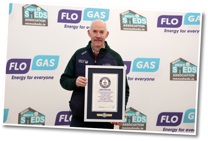  Pat Towey, Ballaghaderreen Men's Shed at the news that The Irish Men’s Shed Association sponsored by Flogas Achieve Official Guinness World Record for the Largest Display of Kettles 19/11/2024 The Irish Men’s Shed Association, sponsored by energy company Flogas, have successfully achieved the official Guinness World Record for the Largest Display of Kettles. Kettles are the most important tool in supporting social connection and mental wellbeing for ‘Shedders’. Over one thousand new and old kettles in working order collected from Sheds nationwide and donated by Flogas were on display at the Association’s annual conference and shedfest in Mucklagh Community Centre, Tullamore, Co. Offaly on Tuesday 19th November 2024. The official Guinness World Record certificate for the Largest Display of Kettles was presented by adjudicator Seyda Subasi Gemici to Irish Men's Sheds members Mandatory Credit ©INPHO/James Crombie