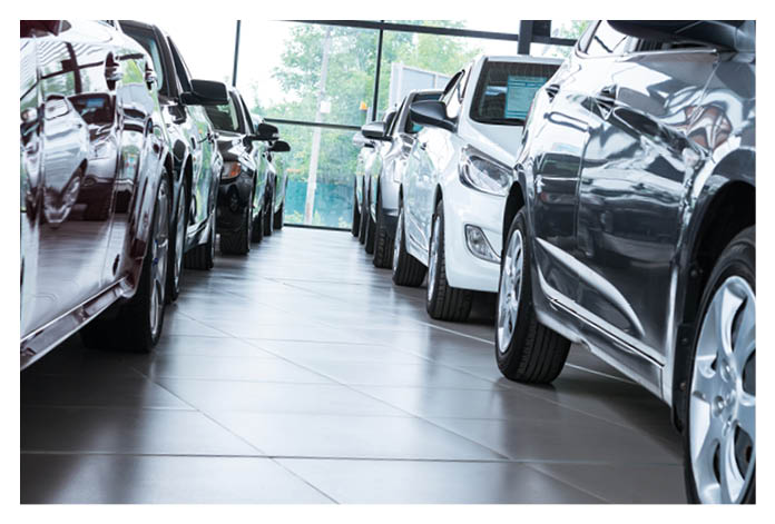 Modern beautiful showroom with cars being sold