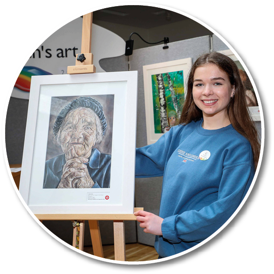 ***FREE TO USE IMAGE - NO REPRODUCTION FEE*** Young Antrim artist, Charley Bell – a 17-year old student from Methodist College Belfast – has been chosen overall winner of this year's 70th Texaco Children's Art Competition, taking first prize in the senior 16-18 years age category for her detailed portrait entitled ‘Anticipation’. Charley is pictured with her prize-winning artwork at a function to announce the top winners held in Dublin. Photo Credit (Mac Innes Photography/Justin Mac Innes)