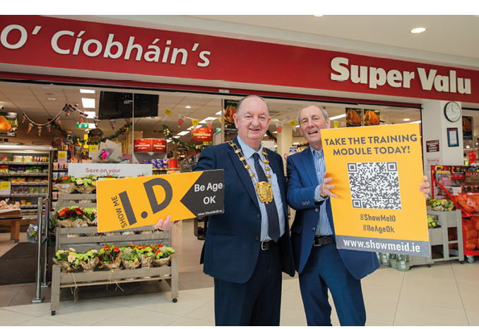 **NO FEE PIC ** 03/12/2025 L to R Mayor of Fingal Tom O Leary Owner of Supervalu O'Ciobhain's Donal O Ciobhain pictured during the Show Me ID campaign at Boroimhe Shopping Centre, Swords, Co Dublin. Photo: Gareth Chaney