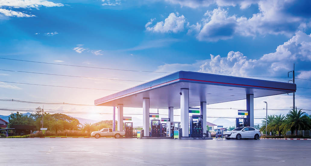 Gas fuel station with clouds and blue sky