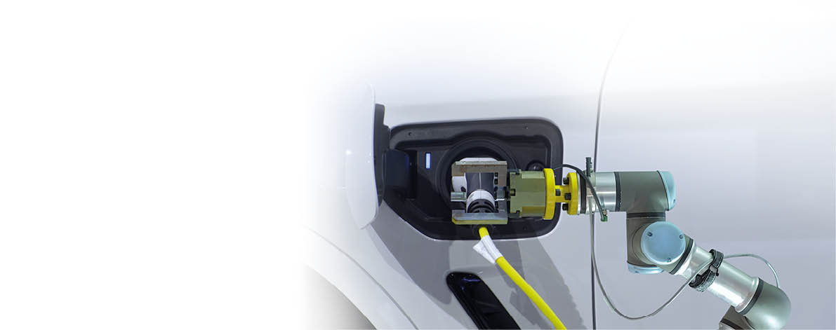 Close-up automation robotic working with handgrip of rechargeable electricity machine for recharge battery to white smart Electrical Vehicle or EV car