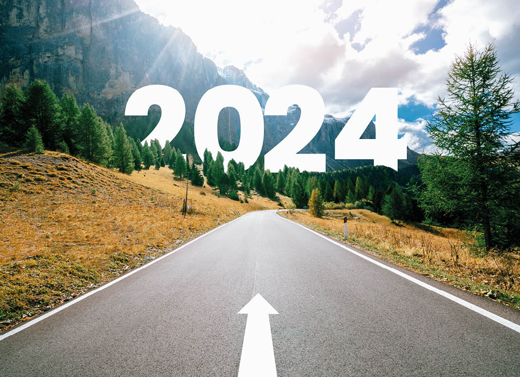 2024 New Year road trip travel and future vision concept . Nature landscape with highway road leading forward to happy new year celebration in the beginning of 2024 for bliss and successful start .