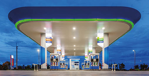 gas station in blue night sky 