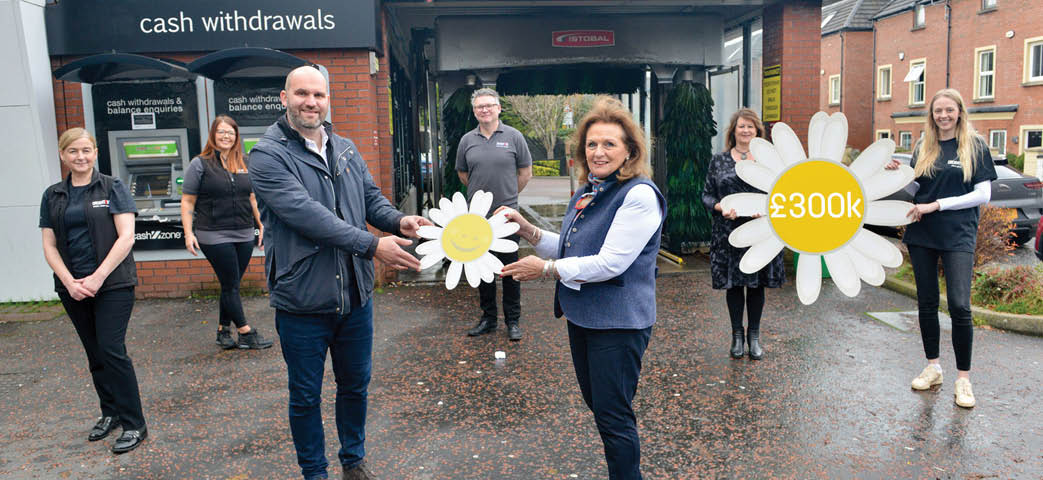 The CREIGHTON GROUP has marked reaching the magnificent milestone of  300k for local children s charity, Cancer Fund for Children  Pictured Front Row L-R: Cancer Fund for Children CEO, Phil Alexander and Director of CREIGHTON GROUP, Gail Boyd  Back Row L-R: CREIGHTON GROUP staff Elaine Williams, Briege McDermott, Andrew Porter, Jennifer Clarke and Sarah Moulds  