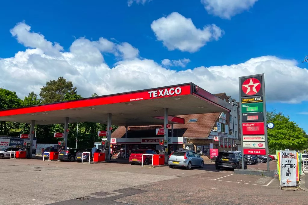 Man arrested after assault on filling station shop worker